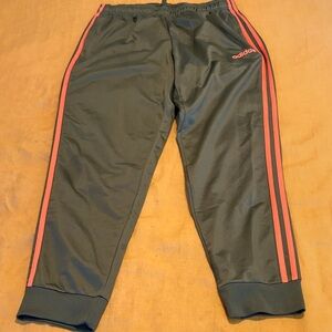 Adidas Men's Joggers in Dark Green with orange Stripes